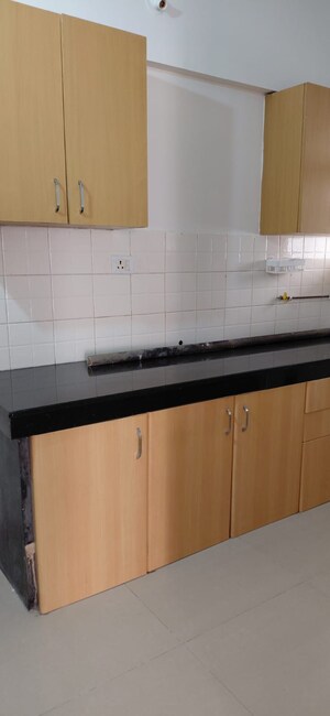Kitchen in 3 BHK Apartment at Nagpal Dev Exotica, Kharadi – for Rent