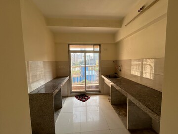 Kitchen in 1 BHK Apartment at Cosmos Jewels, Ghodbunder Road – for Rent