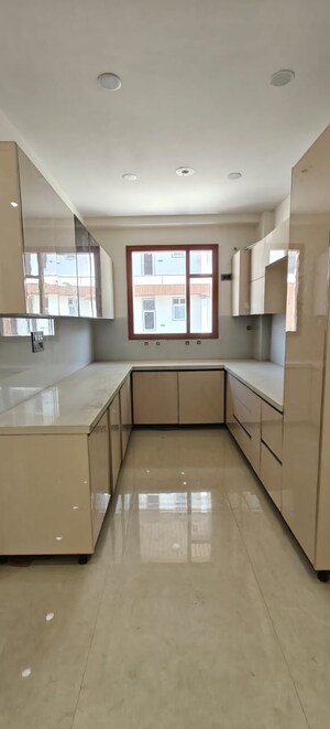 Kitchen in 4 BHK Builder Floor at Puri Aman Vilas, Sector 89 – for Sale