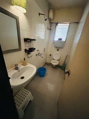 Bathroom in 2 BHK Apartment at Montreal Tower, Andheri West – for Rent