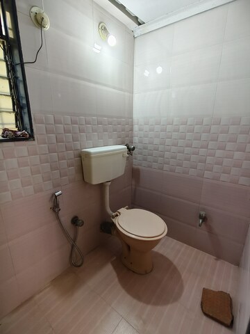 Bathroom in 2 BHK Apartment at Gokuldham Complex, Goregaon East – for Rent