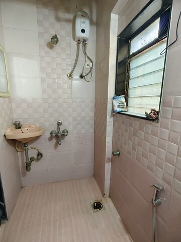 Bathroom in 2 BHK Apartment at Gokuldham Complex, Goregaon East – for Rent