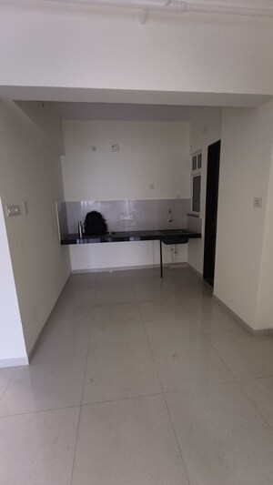 Kitchen in 2 BHK Apartment at Kolte Patil R10, Hinjewadi – for Rent