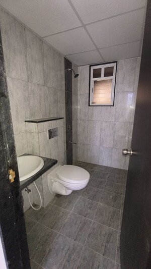 Bathroom in 2 BHK Apartment at Kolte Patil R10, Hinjewadi – for Rent