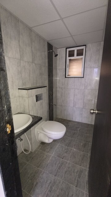Bathroom in 2 BHK Apartment at Kolte Patil R10, Hinjewadi – for Rent