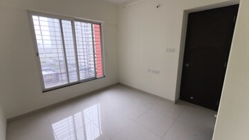 Room in 2 BHK Apartment at Kolte Patil R10, Hinjewadi – for Rent