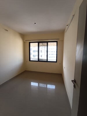 Master Bedroom in 1 BHK Apartment at Ajmera Yogi Dham Phase III, Kalyan West – for Sale