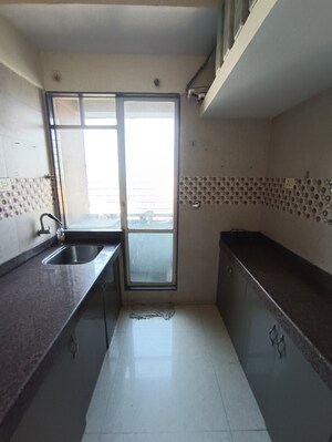 Kitchen in 2 BHK Apartment at Ajmera New Era, Kalyan West – for Sale