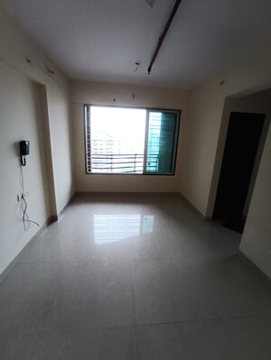 Living Room in 2 BHK Apartment at Ajmera New Era, Kalyan West – for Sale