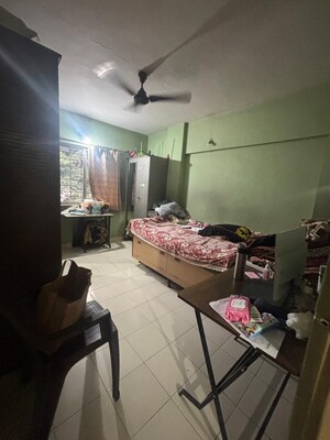 Bedroom in 2 BHK Apartment at Gurukrupa Memories, Kharadi – for Rent