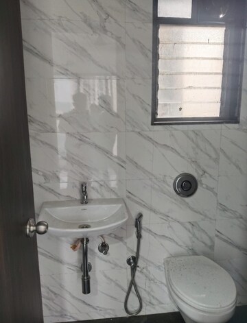 Bathroom in 1 BHK Apartment at UK Iridium, Kandivali East – for Rent