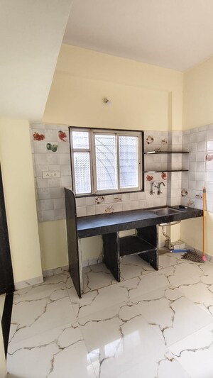 Kitchen in 1 BHK Apartment at Wadgaon Sheri – for Rent