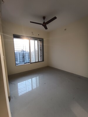 Room in 2 BHK Apartment at Yogi Ajmera Bliss, Kalyan West – for Sale