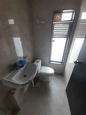 Bathroom in 1 BHK Apartment at Yogi Ajmera Bliss, Kalyan West – for Sale