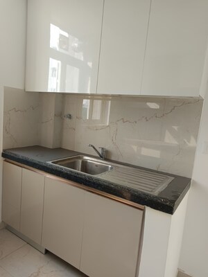 Kitchen in 2.5 BHK Apartment at Smart World Gems, Sector 89 – for Rent