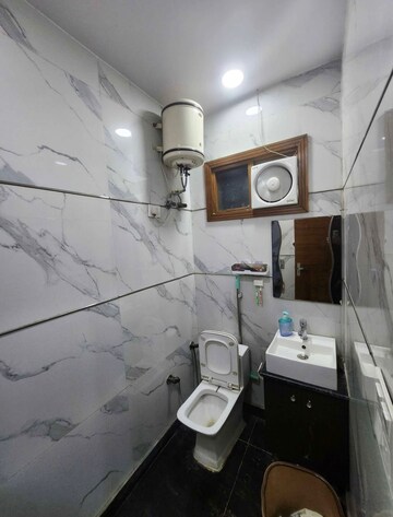 Bathroom in 3 BHK Builder Floor at Paschim Vihar – for Sale