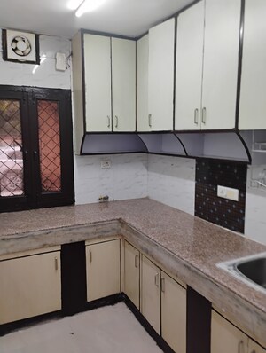 Kitchen in 2.5 BHK Apartment at Rohini Sector 9 – for Rent