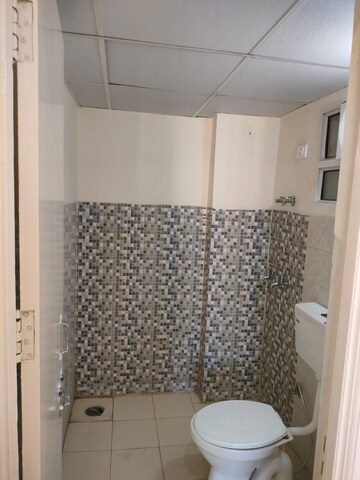 Bathroom in 2 BHK Apartment at Wave City, Wave City – for Rent
