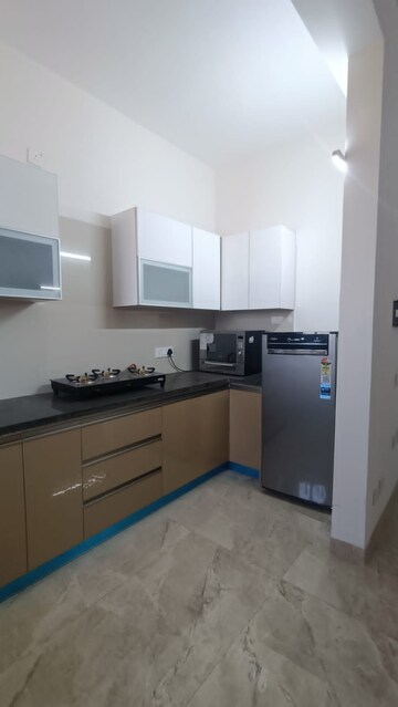 Kitchen in 3 BHK Apartment at Artique Uptown Skylla, International Airport Road – for Rent