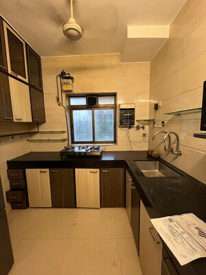 Kitchen in 3 BHK Apartment at Dheeraj Gaurav Heights, Jogeshwari West – for Rent