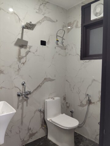 Bathroom in 2 BHK Builder Floor at Freedom Fighters Enclave – for Rent