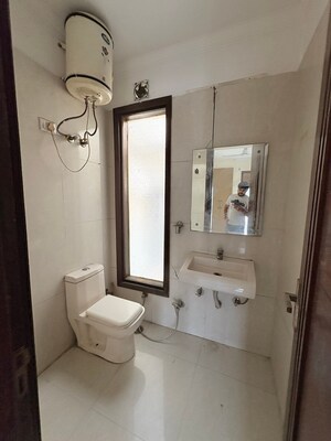 Bathroom in 2 BHK Builder Floor at Chattarpur – for Rent