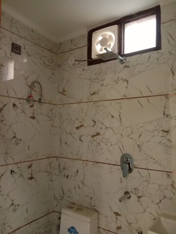Bathroom in 4 BHK Builder Floor at Dwarka Mor – for Sale