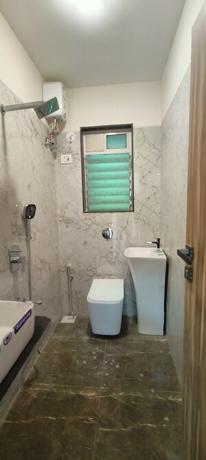 Bathroom in 2 BHK Apartment at Shri Mahavir Krupa CHS, Borivali West – for Sale