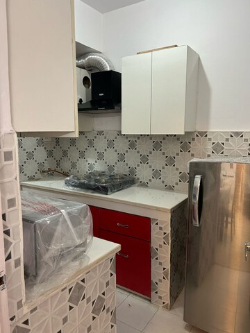 Kitchen in 1 BHK Apartment at Paras Tierea, Sector 137 – for Sale