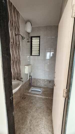 Bathroom in 1 BHK Apartment at Wadgaon Sheri – for Rent
