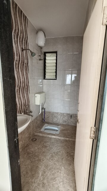 Bathroom in 1 BHK Apartment at Wadgaon Sheri – for Rent