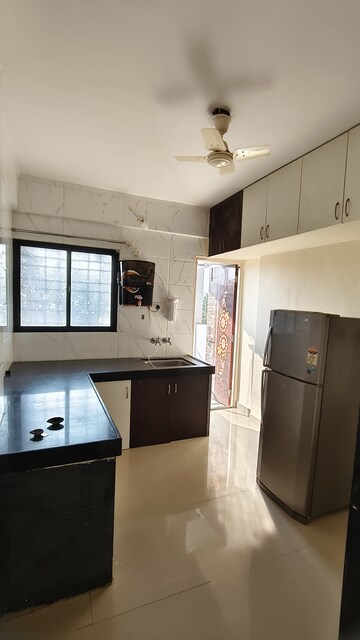 Kitchen in 1 BHK Apartment at Wadgaon Sheri – for Rent
