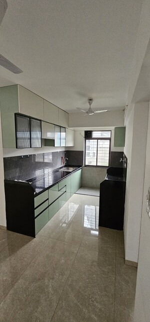 Kitchen in 2 BHK Apartment at Wakadkar Stellar Rhythmm, Wakad – for Rent