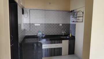 Kitchen in 2 BHK Apartment at Lifestyle Royal Oak, Wakad – for Rent