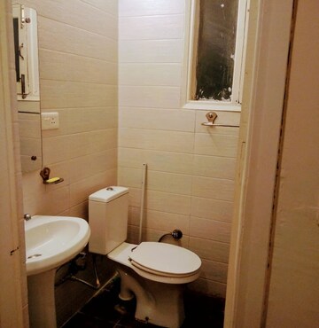 Bathroom in 3 BHK Apartment at NK Savitry Enclave, Vip Road – for Rent