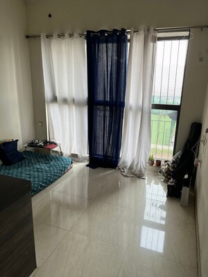 Living Room in 1 BHK Apartment at Lodha Crown Kolshet, Kolshet Road – for Rent