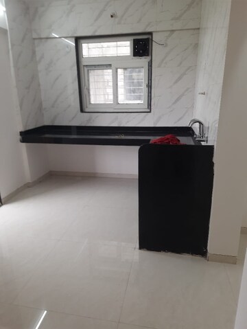 Kitchen in 3 BHK Apartment at Royal Vrundavan, Ravet – for Rent