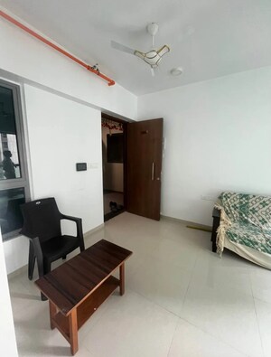 Living Room in 1 BHK Apartment at Kalpataru Immensa, Kolshet Road – for Rent