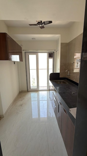 Kitchen in 1 BHK Apartment at Chandak 34 Park Estate, Goregaon West – for Rent