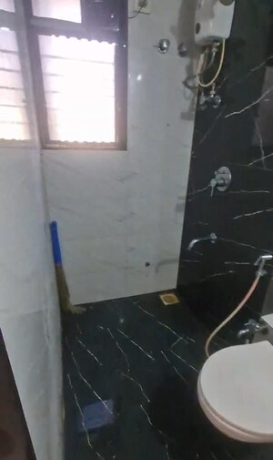 Bathroom in 1 BHK Apartment at Je And Vee Om Trimurti, Malad East – for Rent