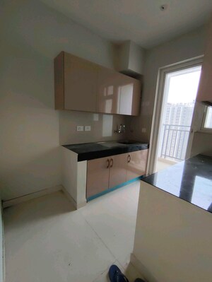 Kitchen in 2 BHK Apartment at Eldeco Live By The Greens, Sector 150 – for Rent