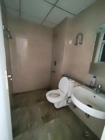 Bathroom in 2 BHK Apartment at Eldeco Live By The Greens, Sector 150 – for Rent