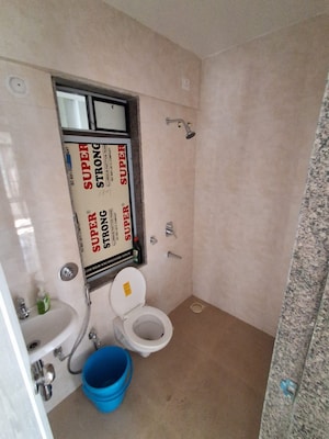 Bathroom in 2 BHK Apartment at BG Shirke Monte Verita, Borivali East – for Rent