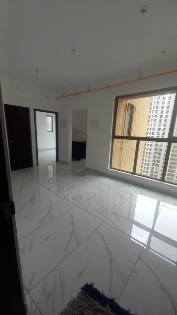 Living Room in 1 BHK Apartment at Raymond Ten X Habitat, Pokhran Road No Two – for Rent
