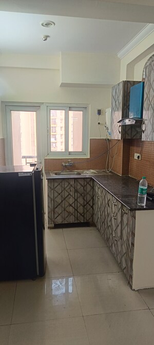 Kitchen in 2 BHK Apartment at Sikka Karmic Greens, Sector 78 – for Rent