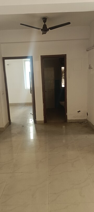 Building Lobby in 2 BHK Apartment at Sikka Karmic Greens, Sector 78 – for Rent