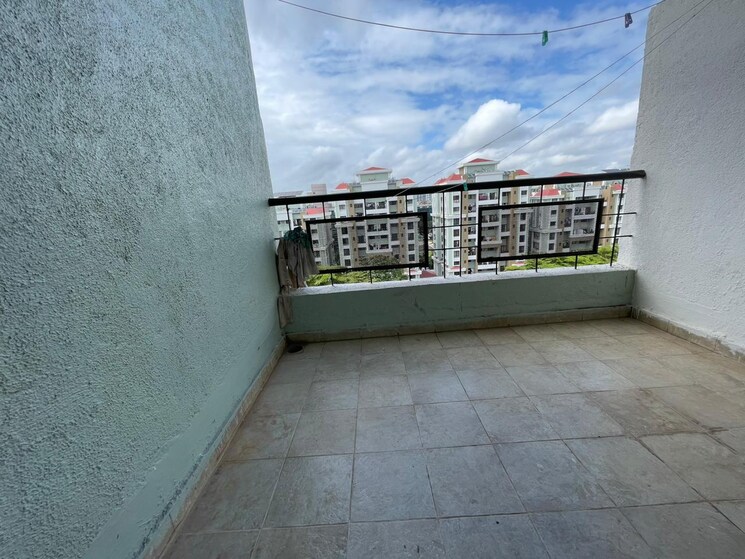 Balcony, magarpatta-city-iris 2 Bedroom 1000 Sq.Ft. Apartment In Hadapsar Pune 9460514