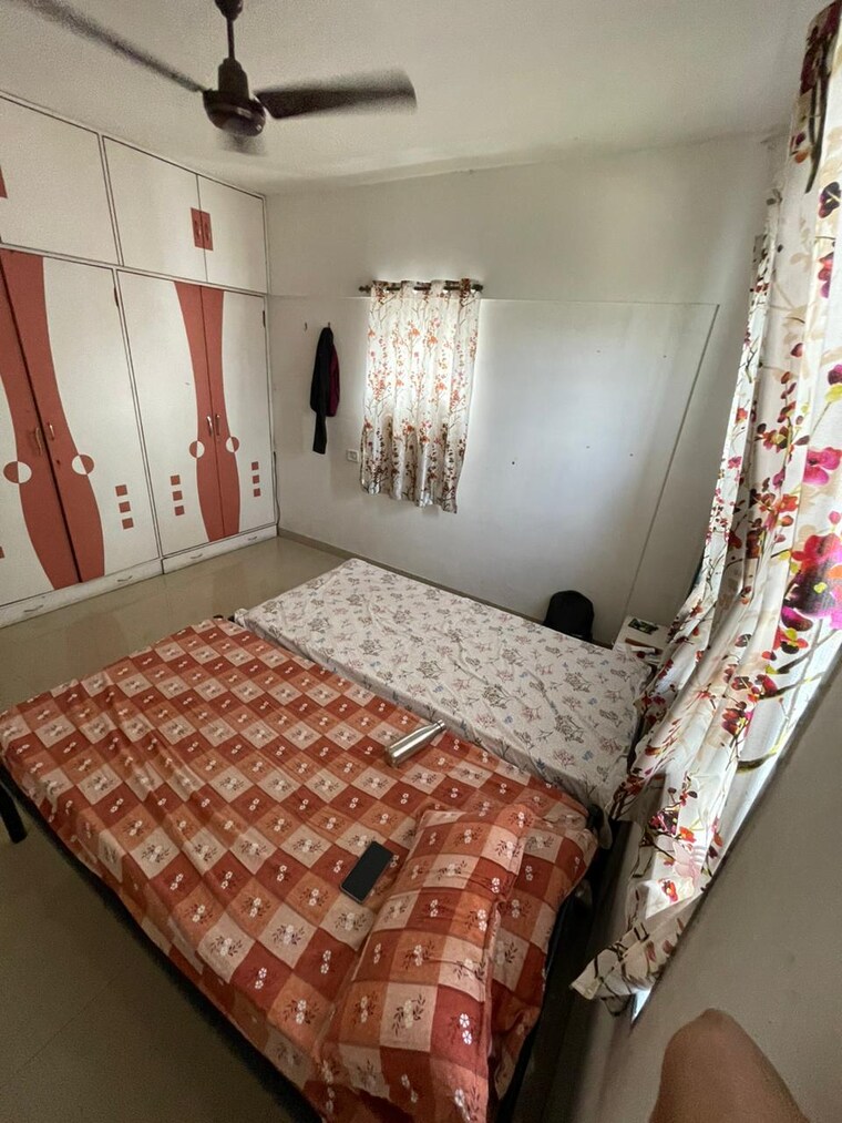 Bedroom, magarpatta-city-iris 2 Bedroom 1000 Sq.Ft. Apartment In Hadapsar Pune 9460514