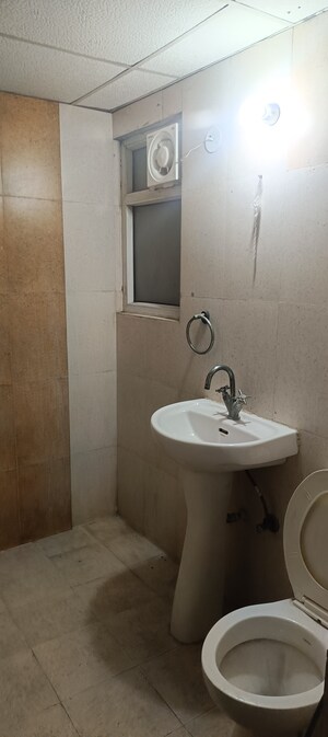 Bathroom in 2 BHK Apartment at Antriksh Golf View, Sector 78 – for Rent