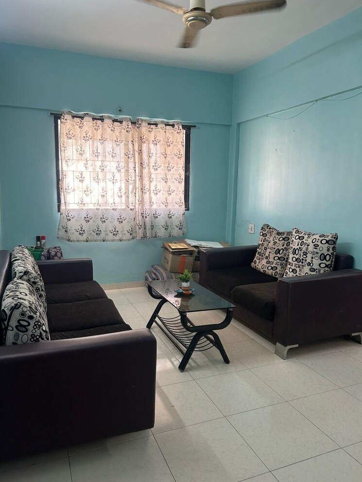 Living Room, magarpatta-city-heliconia 1 Bedroom 700 Sq.Ft. Apartment In Hadapsar Pune 9460519